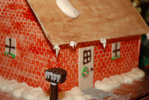 Sugary blobs of snow grace this red-brick chocolate house, one of the entries in the 2008 Food Show at Pennsylvania College of Technology.