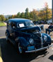 A vintage Ford shines during a car show to raise money for the Student Leader Legacy Scholarship fund