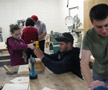 Students help Scouts, troop leaders assemble birdhouses