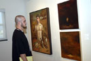 A gallery patron studies the latest exhibit