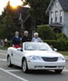 College Town leaders cruise Fourth Street under a setting sun