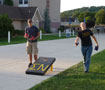 Tossing beanbags in friendly competition are Clifford Nanfeldt, Phi Mu Delta (left), and Bryann R. Bingaman, Sigma Nu