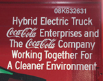 A touch of 'green' is added to Coca-Cola's trademark red and white.