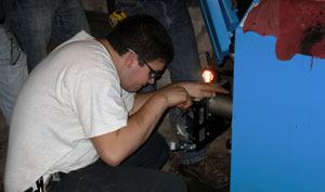 Gregory J. Miller, at work on a boiler-replacement project.
