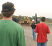 Instructor Budd L. Greevy emphasizes constant vigilance when working with heavy machinery
