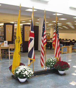 Historical flags displayed at Madigan Library for Constitution Week.