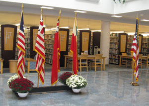 On loan from the Jersey Shore Elks lodge, the 'Hall of Flags' exhibit impressively stands beneath the library skylight.