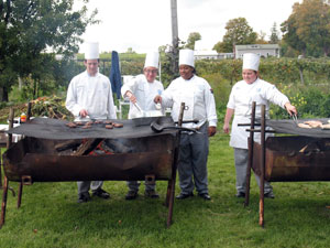 Pennsylvania College of Technology students Aaron D. Hileman, of Altoona%3B Matthew S. Dansky, of State College%3B Meagan S. Morris, of Herndon, Va.%3B and Stephanie M. Davis, of Ford City, staff the grill at the Hunt Country Vineyards in Branchport, N.Y.%0A%0A