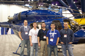 William F. Stepp III, associate professor of aviation (center), is joined at the recent Heli-Expo in Houston, by (from left) Penn College aviation maintenance technology majors Gregory G. Gilliland, Wesley C. Miller, William F. Stepp IV and Jason C. Hawbaker.