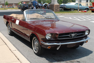 A student-refurbished 1965 Ford Mustang, which gave rise to a new automotive restoration technology major at  Penn College, has its day in the sun outside the Antique Automobile Club of American Museum in Hershey.