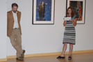 Penny G. Lutz, gallery assistant, introduces Holland for a gallery talk