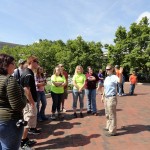 Smithsonian gardener Sarah A. Tietbohl talks with visiting horticulture students from her alma mater