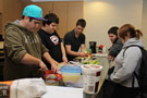 RA Lewis D. Robinson (center), in the kitchen with School of Hospitality colleagues Craig T. Capista, Samuel Bagel, Patrick J. Hrubes and Krista M. Fields