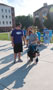 Student Government Association President Gregory J. Miller meets 'Jake,' a husky mix, and co-owner Noelle B. Bloom, assistant director of dining services