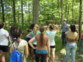 Forestry instructor Jason M. Shaw helps SMART Girls identify 20 species of trees in the ESC's 'living laboratory'