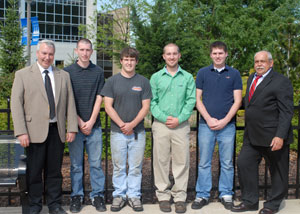 Four welding and fabrication engineering technology students at Pennsylvania College of Technology, awarded scholarships from the John Deere Foundation, gather with the School of Industrial and Engineering Technologies administration outside the college%E2%80%99s Madigan Library. From left are William E. Mack, assistant dean of industrial and engineering technologies%3B students Christopher J. McKelvey, Ryan P. McCollum , Nathan F. Lott and  William J. Ebert%3B and Donald O. Praster, dean of industrial and engineering technologies.