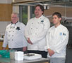 The judges  from left, Robert A. Armstrong, sous chef at Penn College; Peter G. Zerbe, executive chef at Bucknell University; and Michael R. Yaw, student laboratory assistant for food and hospitality/culinary arts at Penn College  await their on-air introductions