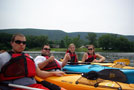 RA Lee D. Michels (second from left) and student Courtney M. Norder (far right) have a great time paddling with friends Justin G. Jacobeen and Melissa R. VanNorman