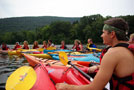 Student Ambassador and Resident Assistant Anthony R. Grubbs hangs out on the river as the group receives instruction
