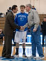 Coach Bruno shakes hands with Gary Knepp, father of Wildcat senior Mike Knepp