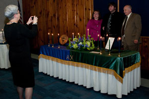 President Gilmour captures a family memory for Andrew T. Koskie and his parents.