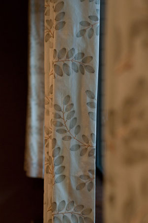 New curtains are among the plant-inspired textures and patterns throughout the dining room.