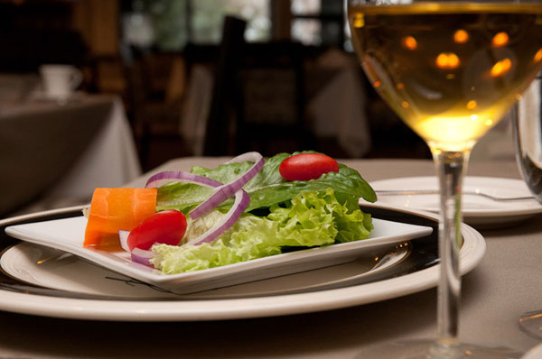 Planters and the bulk of the restaurant%E2%80%99s woodwork were handcrafted from Pennsylvania walnut by Bill Geyer, assistant professor of building construction technology.