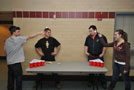 Vying for the water-pong championship are, from left, Mike Lumm, Jonathan Netter, Adam Yoder and Whitnie-rae Mays