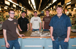 Pennsylvania College of Technology students in a Fixture Design and Fabrication course, from left, Adam J. Becker, Nicholas M. Rumble, Anthony R. Marks, Matthew S. Shupp and Derek L. Anderson, produced titanium brake rotors for the Penn State Advanced Vehicle Team%E2%80%99s EcoCAR.