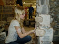 Getting down and dirty, laying blocks in the masonry workshop