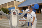 Baseball players join their mascot outside the Susquehanna Room