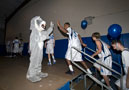 Basketball team high-fives the Wildcat during introductions