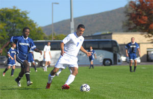 Defender Roberto Barraza, in action against Penn State Schuylkill on Oct. 11. (Photo by Kenneth L. Barto, student photographer)