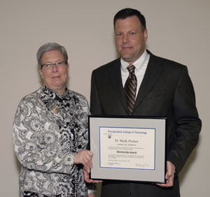 Penn College President Davie Jane Gilmour and Mentorship Award winner Mark Porter.