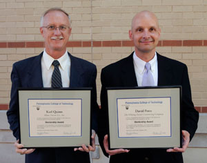 From left, Pennsylvania College of Technology Mentorship Award honorees Karl Quinn, of Alban Tractor Co. Inc.%3B and David A. Potts, of The Whiting-Turner Contracting Co.