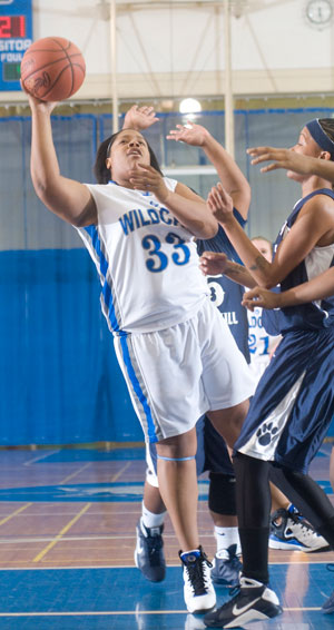 Meagan Morris muscles her way to the hoop.