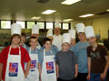 Students celebrate their success with Chef Paul E. Mach