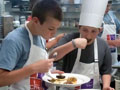 NEO Guys enjoy their 'fabulous' culinary creation in this photo by Barbara P. Benner