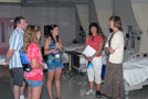 Barbara J. Natell, director of occupational therapy assistant, talks with guests in the School of Health Sciences' nursing lab
