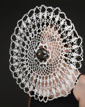 'Object of Mourning 3,' 2007, silver, copper, doily, latex, rubber, soldering, mixed media