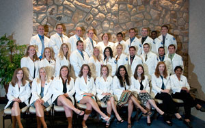 Pennsylvania College of Technology physician assistant students were given new white coats at a July 23 ceremony, symbolizing the start of a clerkship period in which they will work directly with patients and learn alongside trained clinicians. (Photo by Michael S. Fischer, student photographer)