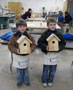 Cub Scouts proudly display their craftsmanship