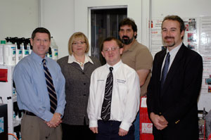Ongoing support for Pennsylvania College of Technology students by PPG Industries Automotive Refinish is marked, from left, by J. Todd Warren, a PPG sales representative; Debra M. Miller, the college's director of corporate relations; Brison W. Kearney, of Williamsport, an alumnus of the collision repair technology associate-degree major; and collision repair faculty members Michael R. Bierly and Roy A. Klinger.