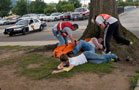 Paramedic students assess 'patients'' injuries