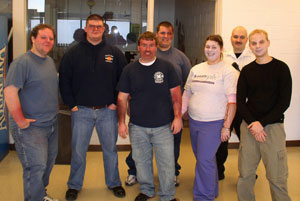 Pennsylvania College of Technology students assisted as %E2%80%9Cpatients%E2%80%9D during a mass-casualty drill at the U.S. Penitentiary at Lewisburg. From left are students Gage E. Lyons-McCracken, Michael D. Eshbach, Steven E. Elliott, Matthew B. Kershes and Cheryl L. Tompkins%3B alumnus and paramedic and training coordinator at the penitentiary, Bryan Walls%3B and student Michael R. Taylor. The students are sporting makeup that was used to simulate injuries during the drill.
