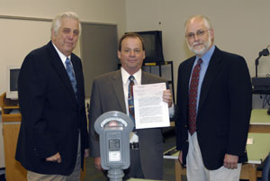 From left, Joseph Laver Jr., secretary of the Williamsport Parking Authority%3B Lawrence J. Fryda, dean of industrial and engineering technologies at Penn College%3B and Richard L. Fenstamaker, chairman of the Williamsport Parking Authority.