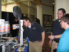 Electronics Students Ben D. Wenger (right) and F. David Nevill show their automated inspection vision system.