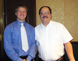 Penn College graduate John T. Lipko (left) and electronics instructor Randall L. Moser.
