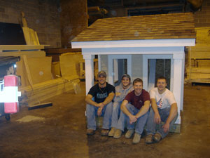 Posing with the Construction Management Association's 'Habitat house' are, from left, students Ryan P. Becker, Nicholas L. Fragello, Samuel H. Foltz and Nicholas J. Colaric.