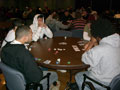 Poker players await the 'river' card